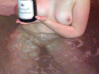 Serving some champagne in hot tub ;)