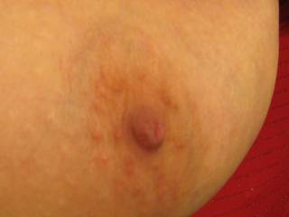 A closeup of Barb's beautiful nipple