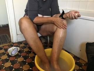 Leg washing, as the guest has a fetish. Round his house in the bathroom she gets them wet so he can takes some pictures. He is getting his camera, and shouts from his bedroom \'are you ready, and can I wash your cunt please\' Her reply \'yes, and yes\' ;)