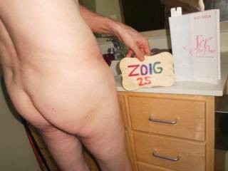 A partial body view from the side that includes my butt as I stand in my bathroom. A W290 camera was used.