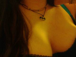 Cool Batman necklace! Your boobs look nice in your bra too ;-) lol.