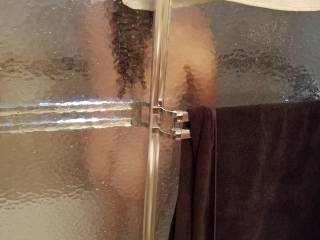 The old "Teasing behind the stained glass shower door" butt shot