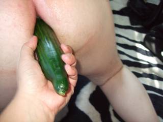 She put me on all fours and inserted the large cucumber