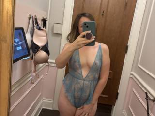 wife trying on some lingerie in dressing room. do you think she’s hot?