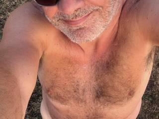 Naked on the cliff top