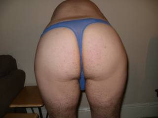 bent over in blue thong panties
