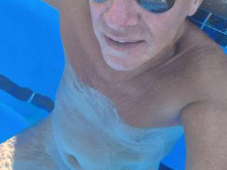 Naked by the pool.