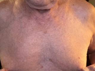 Playing with my long nipples