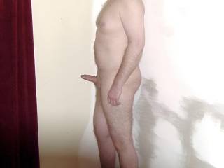 Nude with an erect penis