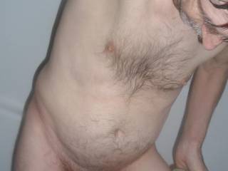 A partial body frontal as I stand looking down at my self after my bath...  early May 2025. Z50 camera was used.