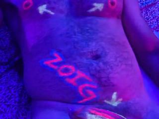 Having fun  playing with my new neon paints and sucking his delicious cum.