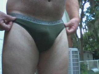 Showing the bulge outside in wife\'s Calvins