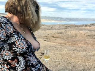 Enjoying a lovely afternoon , warm sun good wine and awesome boobs