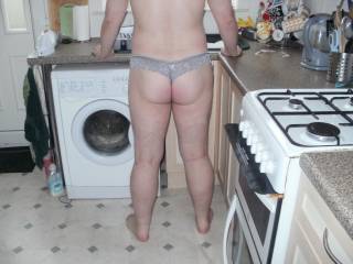 taking a break from doing the dishes, to pose in my panties