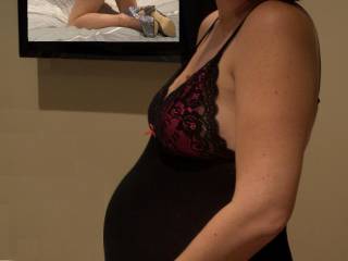 full term, and just hours away from having bubs. hubby couldn't help but want some more sexy pics of my big pregnant belly.