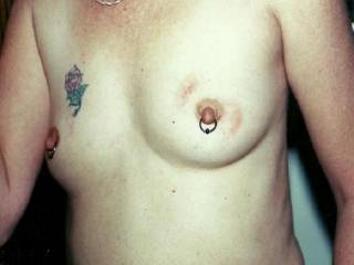 I like some rough sex sometimes. This photo is very hot, can't go wrong with pierced nipples.