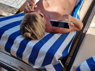 Sunning her vagina and tits