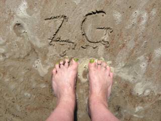 For those foot lovers....I hope you enjoy this as much as I enjoyed sinking my toes into the wet sand for you. :D Lily