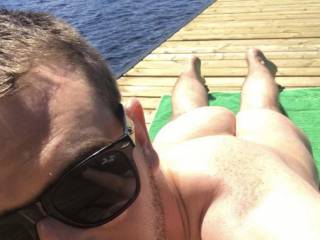 Weekdays at the lake mean tanning nude on the dock!