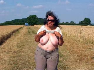 While she poses here under the trees, the guest arrives in a van. Hmmm - wonder how many men are in the back for her ...
