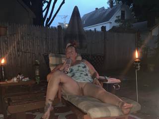 Wife teasing with her pussy in the yard.
