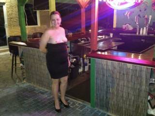 Outside at the tiki bar.
