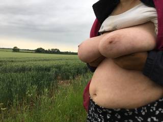 On the left is nice countryside. On the right are big tits