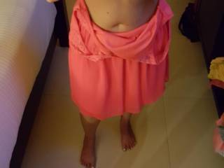 Taking off her dress after dinner..