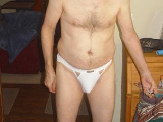 A partial body frontal and wearing my white undie near my bed. Late September, 2024. Sony F717 camera was used.