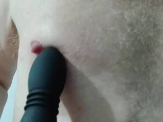 Playing with my nipples with my electric butt plug. Very sensitive... who wants a go?
