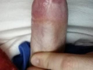 Pulled it out and snapped a photo from behind. Got a tiny bit of precum leaking out of tip. This thing needs sucked badly.