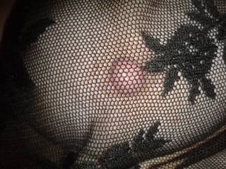 My tit through the black lace skirt ... want to taste my tits ?
