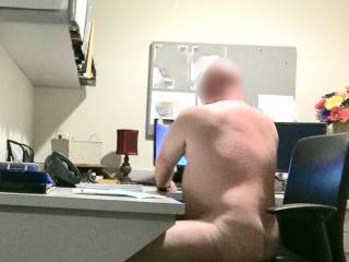 Picture taken at my supervisor’s desk. She came in just after I finished getting dressed. I don’t know why she came in early. If she ever catches me doing anything like this, I hope she lets me off with a spanking and stern talking to. What do you thi