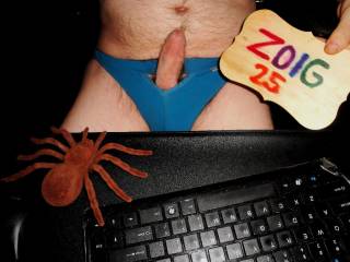 A closer frontal as sit I at my desk wearing my undie with a my harder dick sticking vertically & has a bubble of my fluid upon it.W290 camera was used.