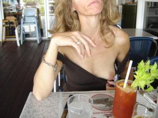 oooh, how sexy!  a suck on the nipple, then on that bloody mary... nice day out!  mmmm