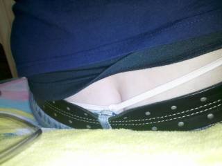Just a quick pic of my ass. My hubby took it while I was sitting. He loves seeing my thongs peek out from my pants!!!