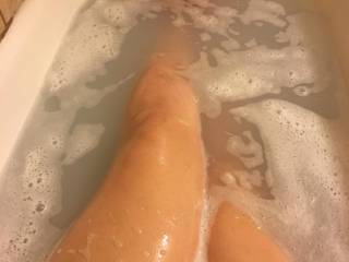 Harley’s feet and legs while playing in a bubble bath