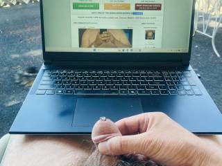 Masturbating on my deck with a sound in my penis and while looking at my Zoig account
