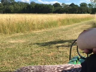 What lovely scenery to relax in, with one tit out ;)