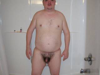 My boyfriend posing after taking a shower. I was trying out my new digital camera!
