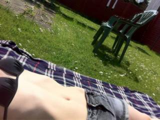 Getting undressed outdoors and enjoying the sun