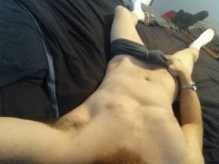 Laying on the bed waiting on the wife to jump on my dick