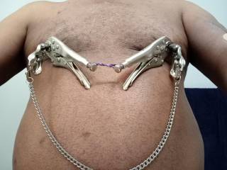 Making my nipples feel the burn! Want to pull on my chain?