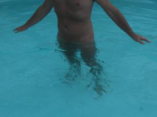 My Hubby in the swimming pool at home. I think his body still looks hot.