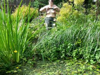 I came home from work to find the Mrs doing some gardening round the pond,  it was too good an opportunity for a quick photo.