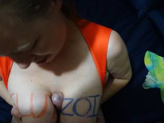 posing for zoig fans with cock between titsd