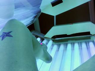Wife in the tanning bed. She has the wettest and fattest pussyever