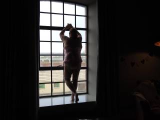 Trying to be artistic in the window of the hotel