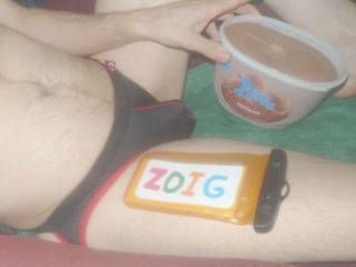 Sitting with some ice cream and wearing one of new undie garments.