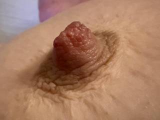 Tight hard nipple up close.